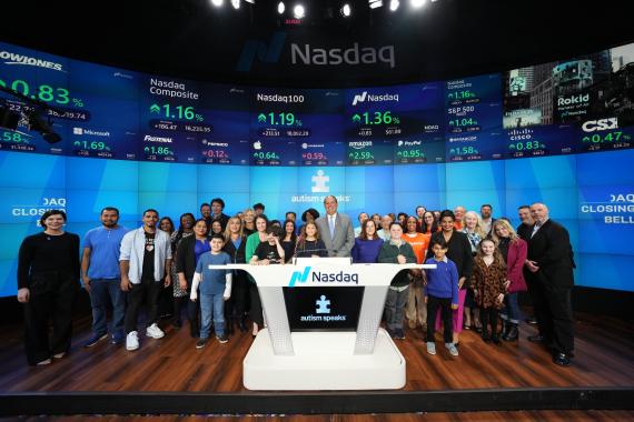 Group of people at the NASDAQ closing bell